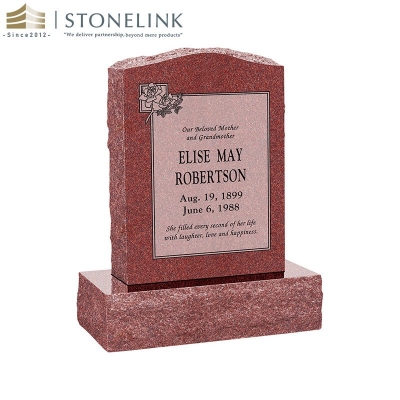 Upright multicolored granite gravestone